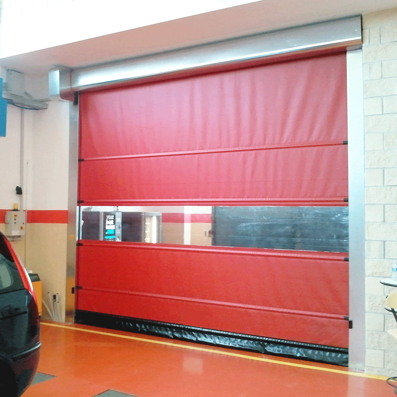 Штора на ворота купить. Противопожарная штора Дорхан. Роллетная система противопожарных штор. Рулонные скоростные ворота противопожарные. Промышленные рулонные шторы ПВХ.
